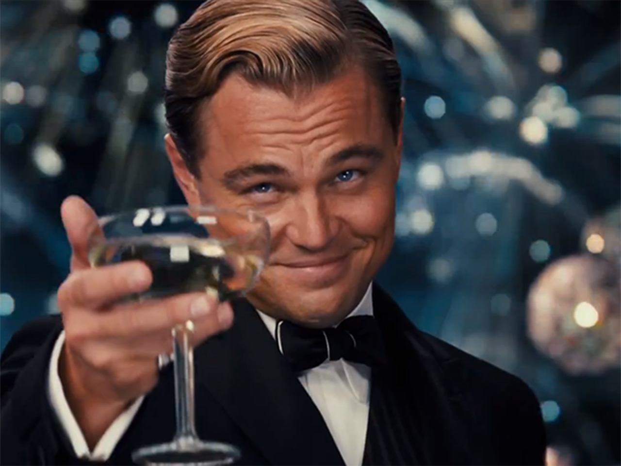 Cheers! Let's toast Leonardo DiCaprio again and again and again