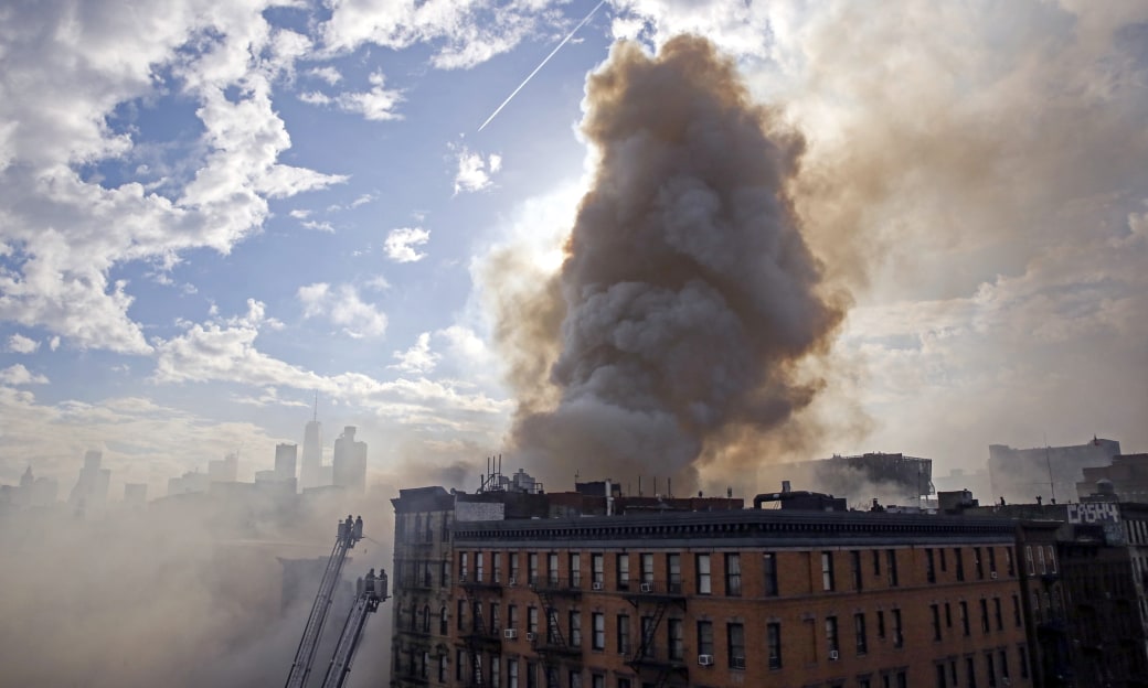 New York City Firefighters Battle Blaze After Massive Explosion.