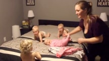 Mom hilariously tries to wrangle 4 kids under 3 in viral video