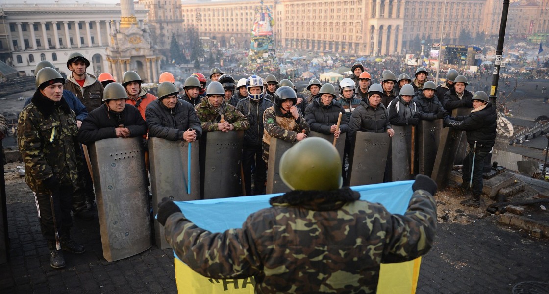 Image: Anti-government protesters man the front line barricades following yesterday's clashes with police in Independence Square, Kiev.
