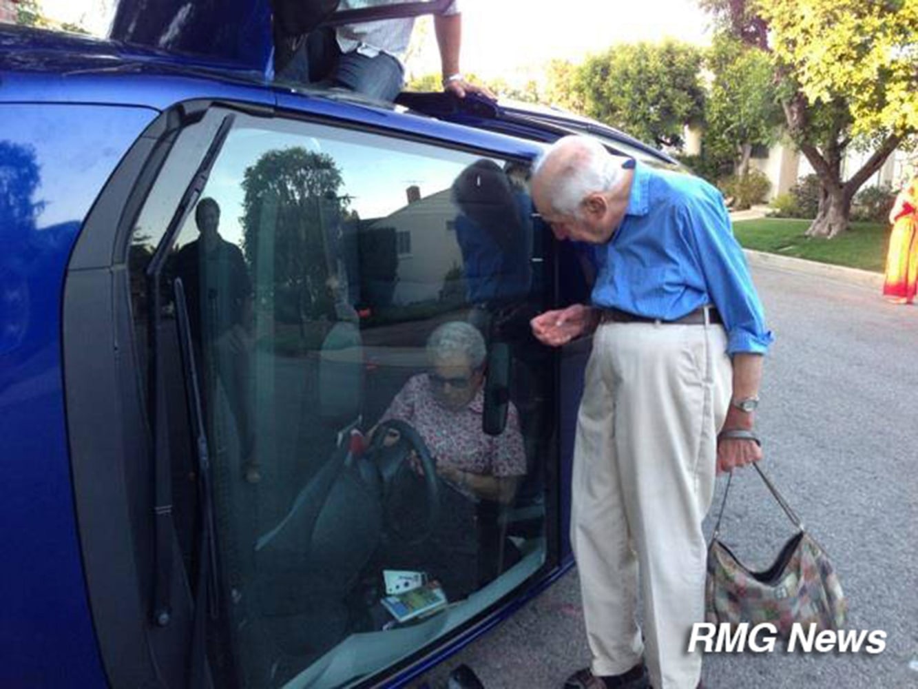 Elderly Couple Poses for Photo After Car Flips - NBC News