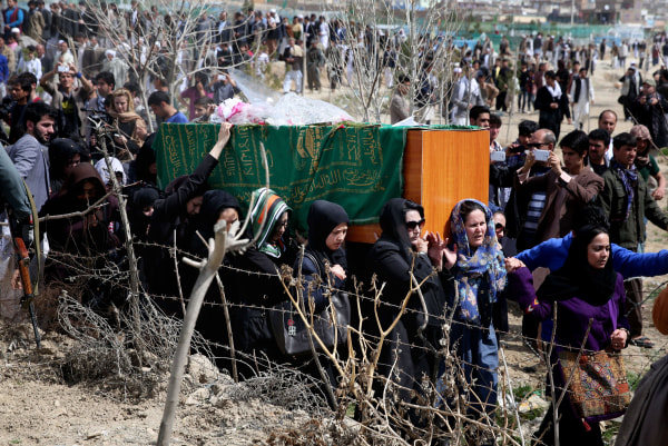 Image:  Afghan women carry Farkhunda's coffin on March 22