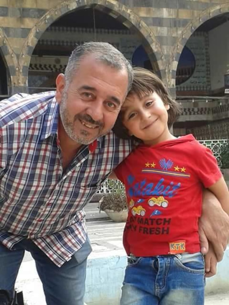 Sýrčan Usáma Abdal-Muhsin so svojím synom Zaídom.
