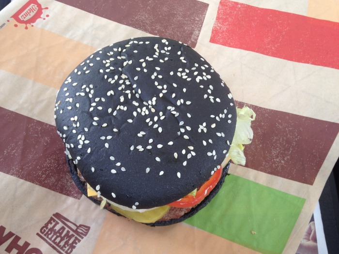Close up of black bun on Burger King's Halloween Burger