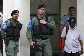 Image: Police officers stand guard at the entrance of Mossack Fonseca