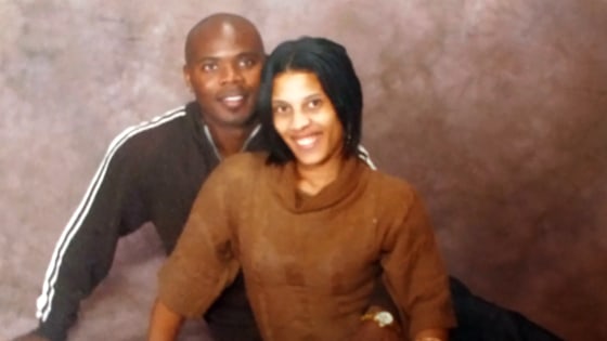 Anderson, here with his wife, LaQonna, has said he never ran from the law.