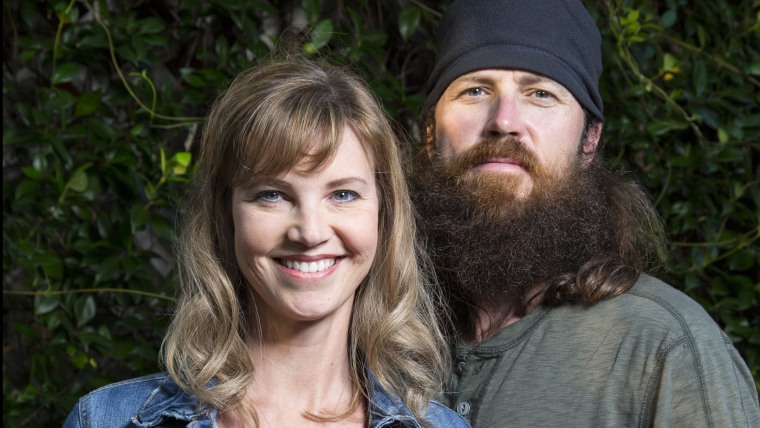 Jase Robertson with kind, Wife Missy Robertson 