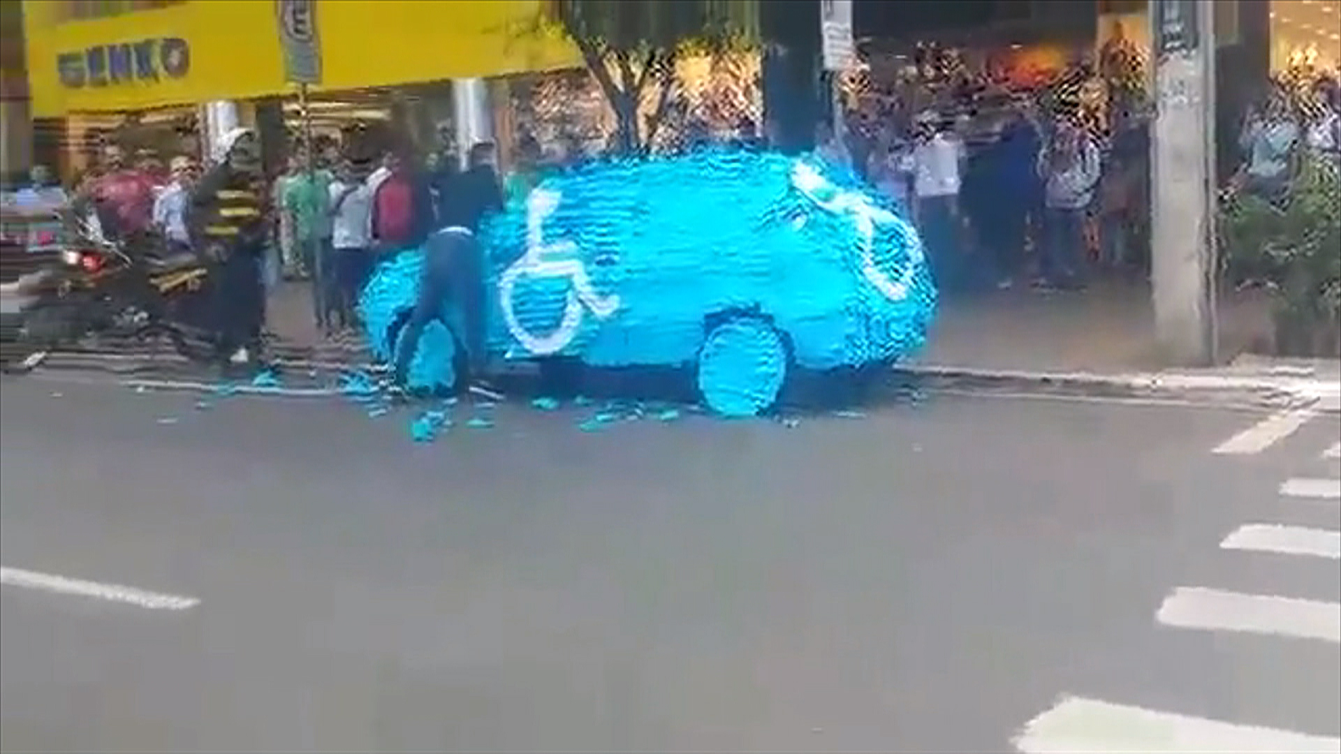 Car illegally parked in handicapped zone plastered with Post-its