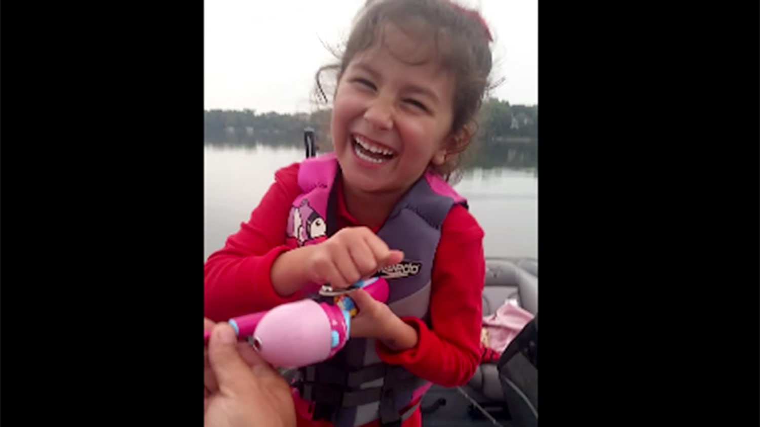 Girl reels in big bass with Barbie fishing pole in sweet daddy