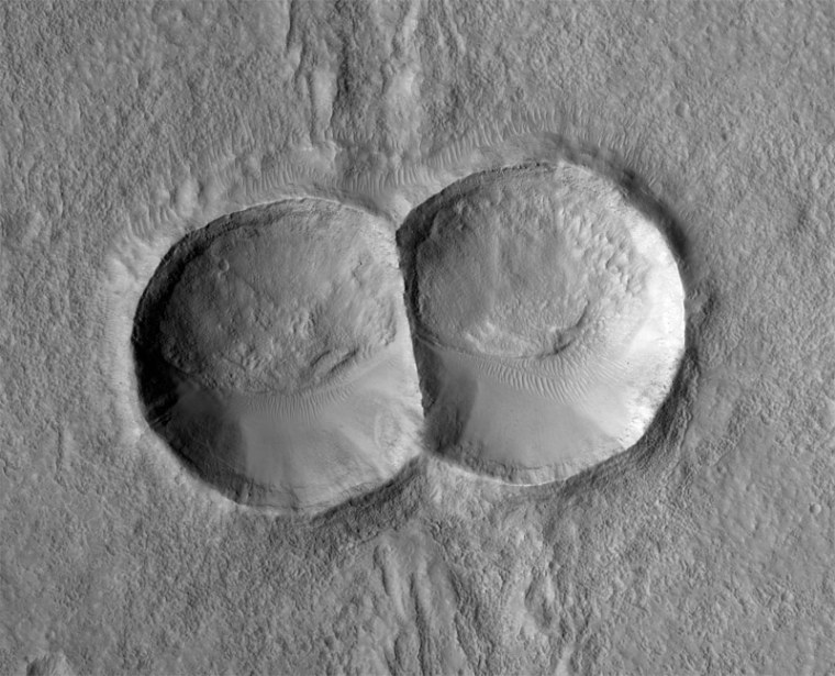 These two impact craters on Mars were formed simultaneously on impact. 