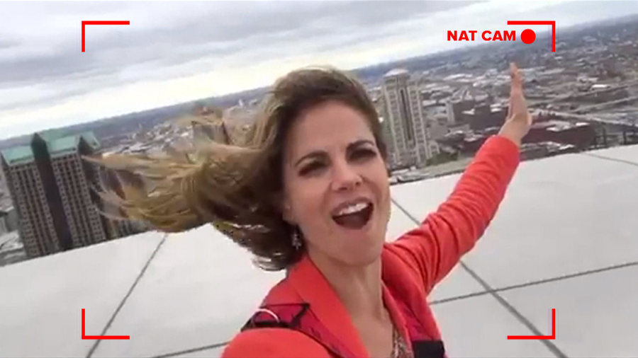 Natalie Morales Pops Out The Top Of The Gateway Arch