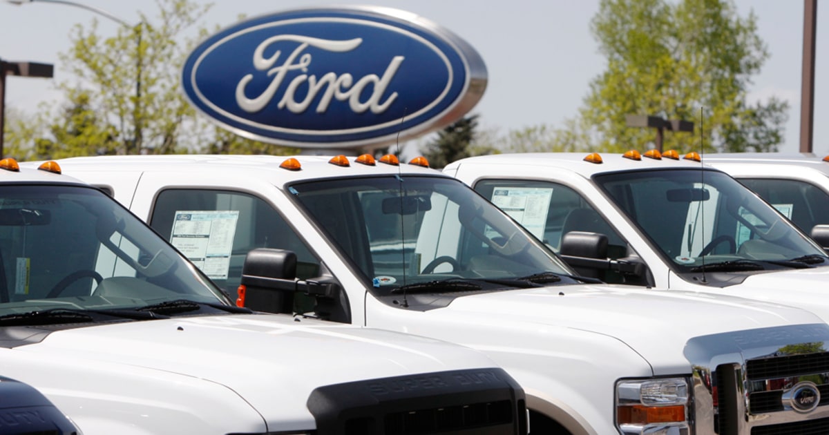 Ford cuts production, moves back profit goal