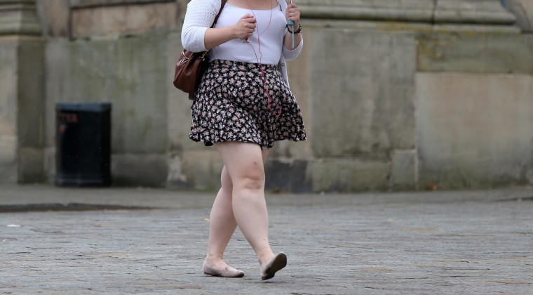 Image: An overweight woman on July 16.