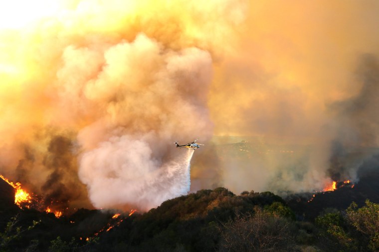 Wildfires Threaten Homes In Calabasas And West Hills Suburbs Of