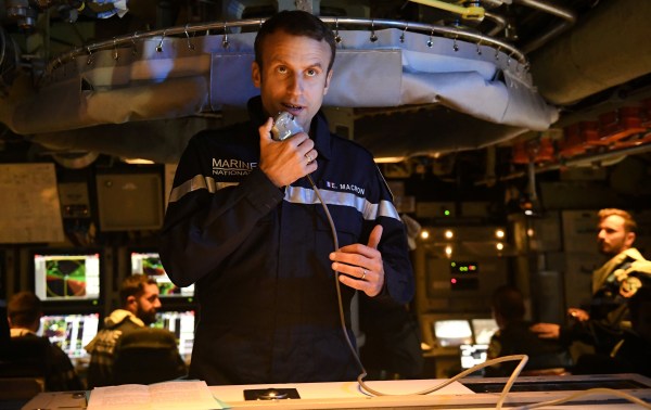 Image: French president Emmanuel Macron speaks to the Captain and crew of the submarine "Le Terrible" from the operations centre of the vessel, whilst at sea