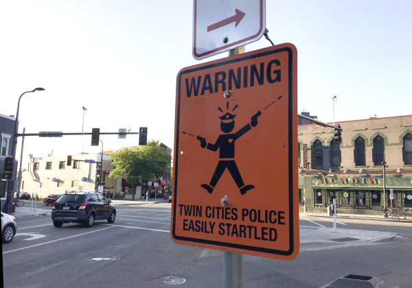 Image: Sign mocking Minneapolis police