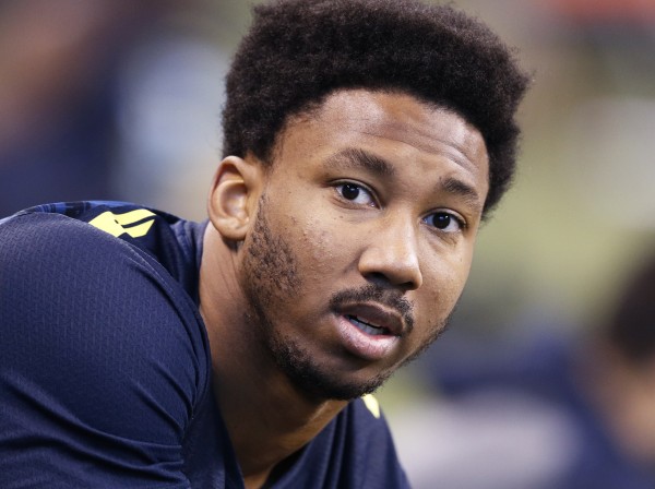 Image: Defensive lineman Myles Garrett of Texas A&M looks on during day five of the NFL Combine