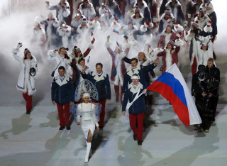 Image: The Russian delegation walks into the Opening Ceremony of the Sochi Winter Olympics