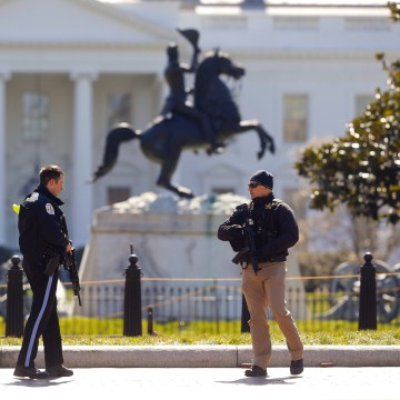 Image: Law enforcement officers at Lafayette Park across from the White House in Washington, close the area to pedestrian traffic, on March 3, 2018.