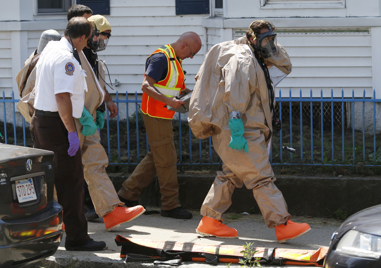 Image: embers of the Hazmat unit respond to the scene of an overdose that killed two people