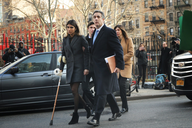Image: Michael Cohen walks to federal court with his children and wife in Manhattan on Dec. 12, 2018.