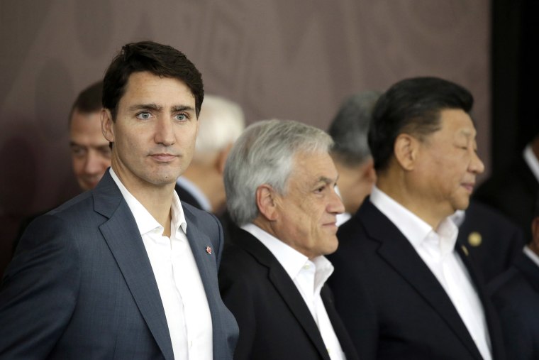 Image: Canadian Prime Minister Justin Trudeau, Chile's President Sebastian Pinera, and Chinese President Xi Jinping