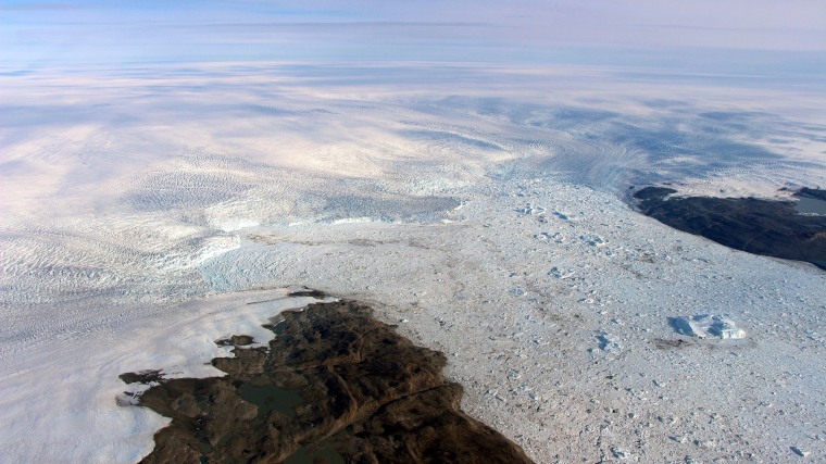 Image: Patches of bare land are seen at the Jakobshavn glacier in Greenland in 2016