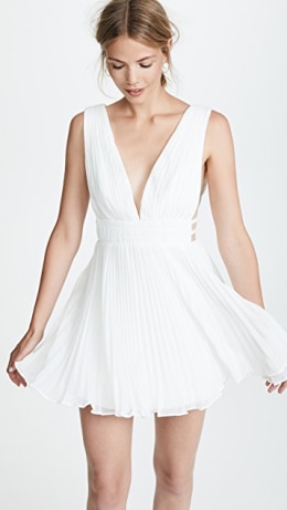white dress under graduation gown