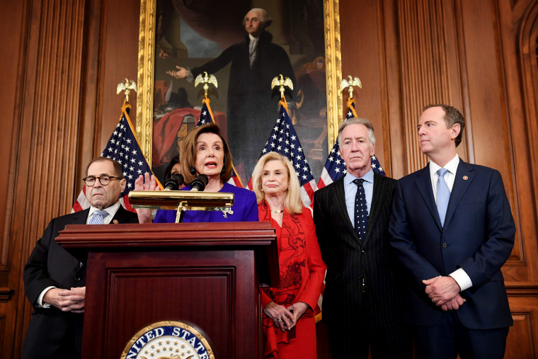 Image: House Speaker Nancy Pelosi holds a press conference with other ranking Democrats to unveil articles of impeachment against President Donald Trump at the Capitol on Dec. 10, 2019.