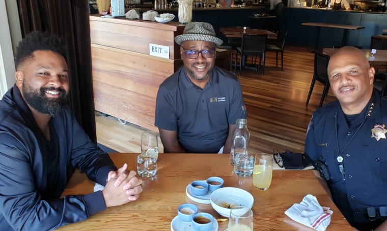 Napa Chamber of Commerce president and CEO Travis Stanley, center, enjoys lunch with two other Black influencers of Napa: master sommelier DLynn Proctor and police chief Robert Plummer.