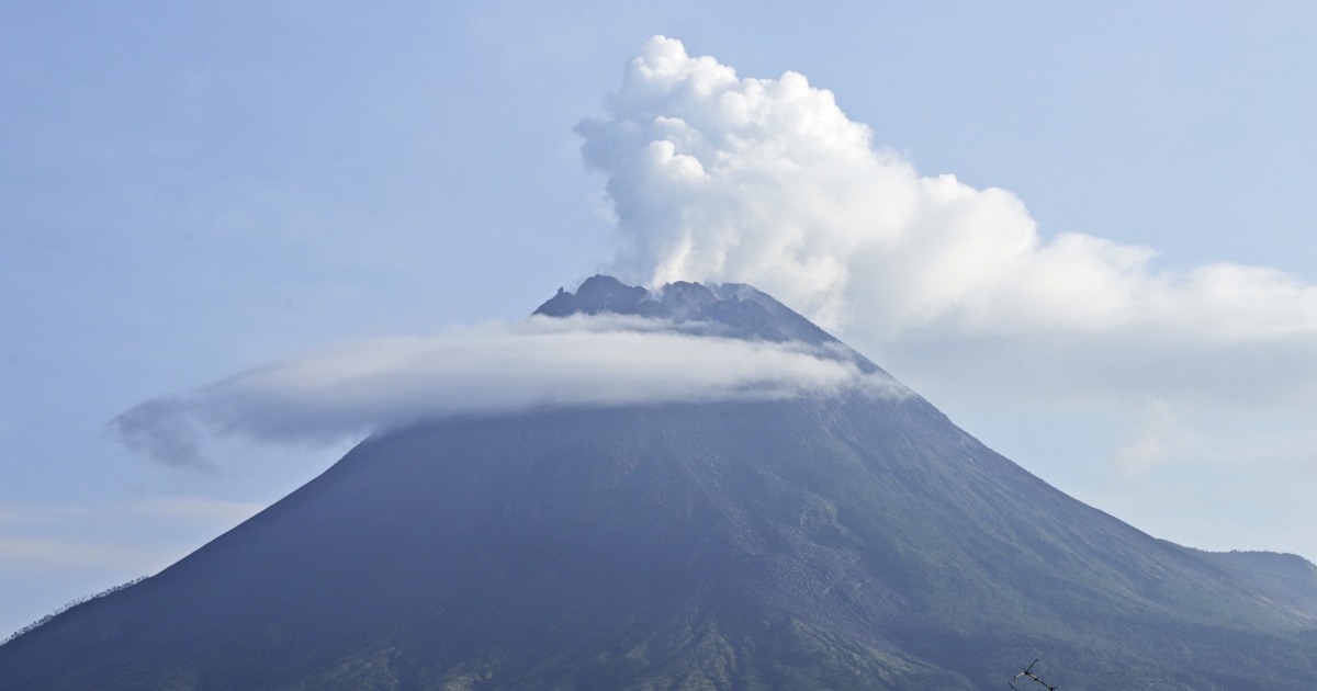 Hundreds evacuated as Mount Merapi volcano in Indonesia spews hot clouds